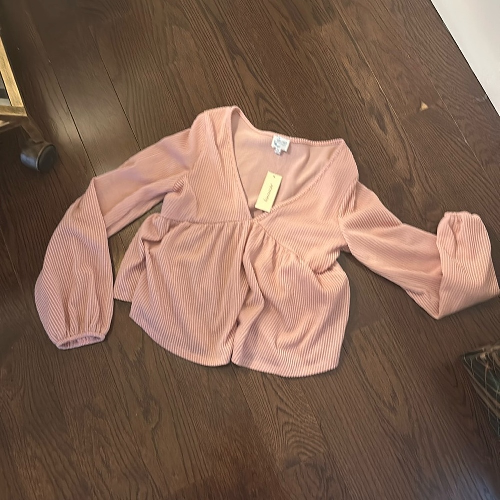 Francesca’s small pink top